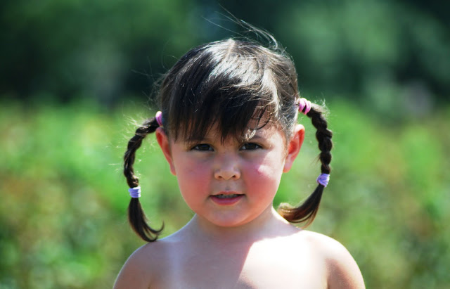 Little Girl with Braids