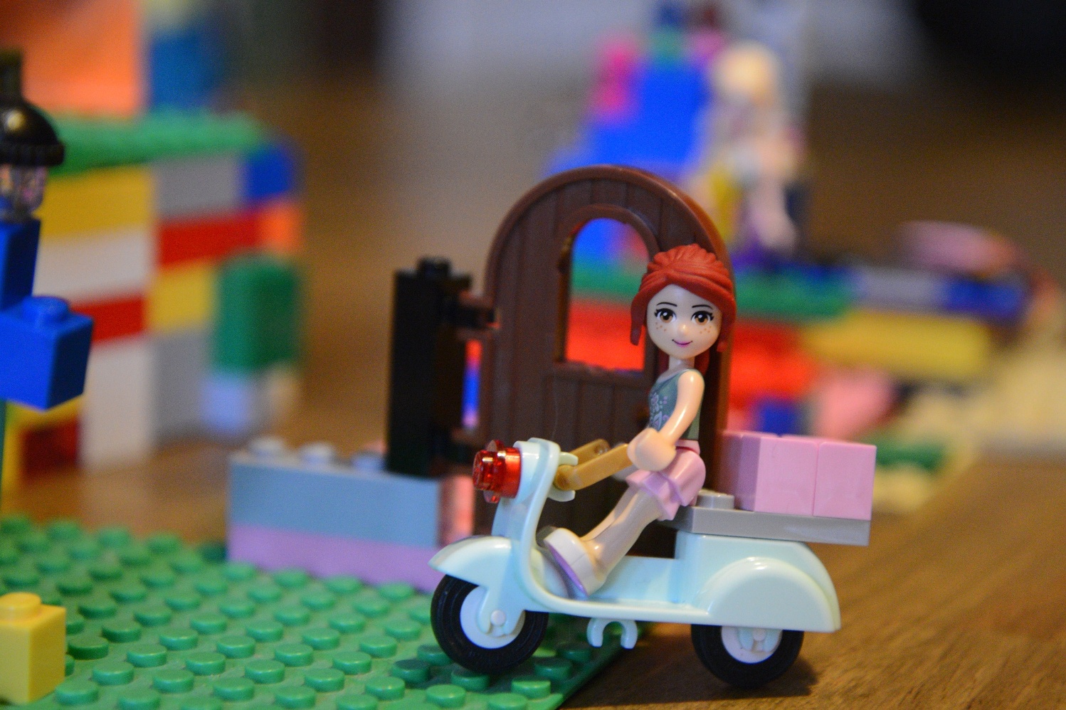Girl on Lego Scooter