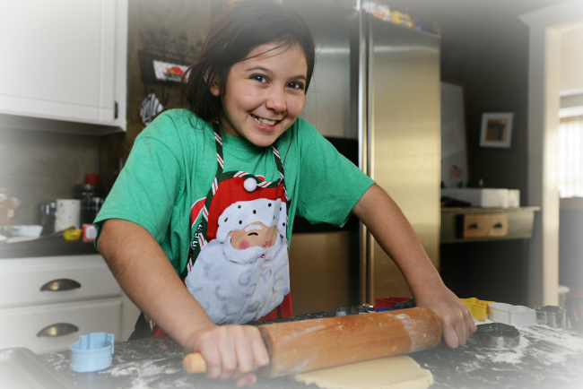 Girl Rolling Out Dough