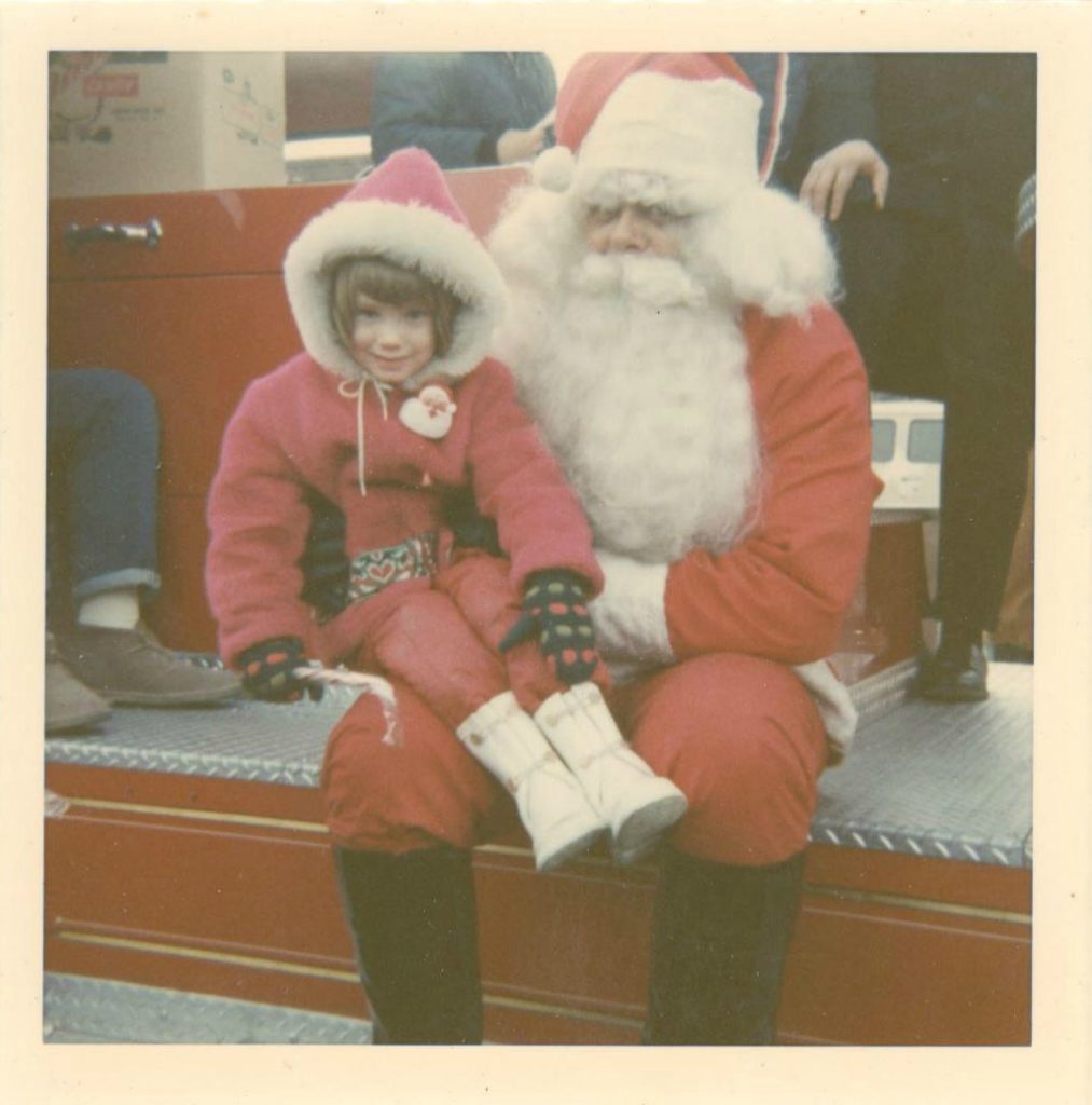 A Gen-Xer sits on Santa's lap in this early 1970s Snapshot.