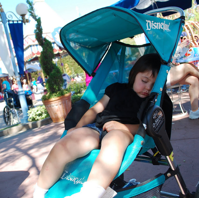 Little girl in a Disneyland Stroller